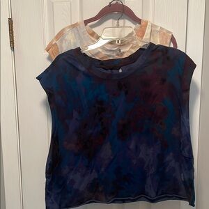 Two new free people tops one’s a small one’s a Medium well fit up to large